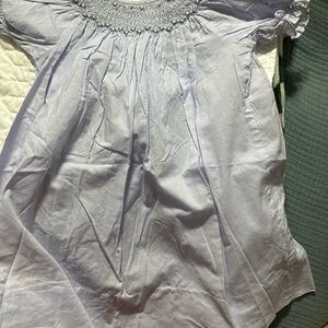 Smocked purple dress. Long style